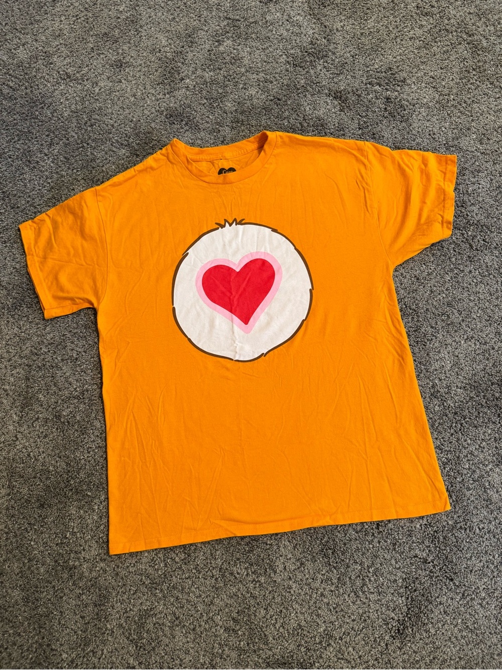 Care Bears Orange Tee with Pink Heart Badge